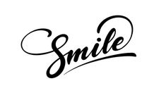 the word smile written in black ink