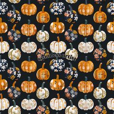 a black background with orange and white pumpkins, flowers and monogrammed leaves