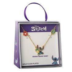 a necklace with charms in the shape of animals on it's chain and box