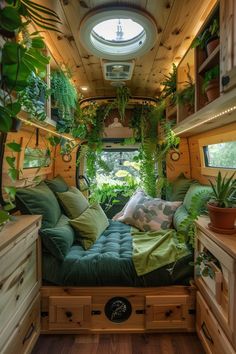 the interior of an rv is decorated with plants and potted plants in green colors