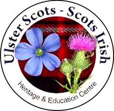 the logo for sisters scotts scottish heritage and education centre, with two blue flowers