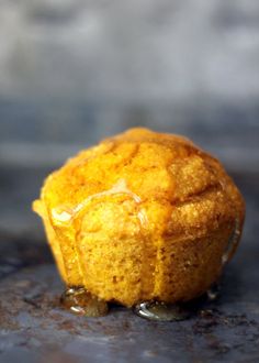 a muffin that is sitting on the ground