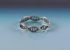 What a great way to express one's individuality, love of life and science, with this unique sterling silver DNA ring. It has a beautiful flow - light and airy. Truly a fun ring to wear! Dna Ring, Helix Ring, Double Helix, Science Jewelry, Yoga Gifts, Yoga Jewelry, Rings Cool, Helix, Sterling Ring