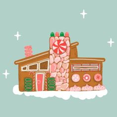 a house made out of doughnuts and candy on top of snow covered ground