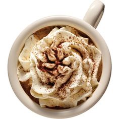 a cup filled with whipped cream and cinnamon