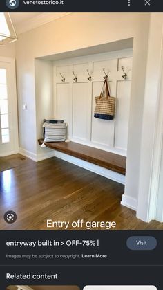 the entryway is clean and ready to be used as a storage area for purses