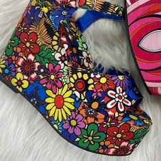 Nu Shuz Key West Multicolor Floral Print Ankle Strap Ultra Platform Wedge Sandal A Fashion-Forward Pair Of 60s 70s Hippie Bohemian Vibe Sandals Is The Perfect Touch Of Dramatic Boho Chic For Spring Summer Features: Brand: Nu Shuz Key West Style: Flower Power Color: Multi Bright Floral Heeled Wedge 4” 1.75” Platform Secure Ankle Strap Styling Adjustable Buckle Round Peep Toe Chunky Platform Wedge Cushioned Footbed True To Size Nu Shuz Key West Groovy Floral Print Ultra Platform Wedge Sandal Multicolor Floral Print Synthetic Sandals, Blue Round Toe Wedge Sandals For Spring, Multicolor Open Toe Heels For Spring, Bold Platform Wedge Heels, Bold Platform Wedge Heel Heels, Blue Chunky Platform Heels For Spring, Bold Platform Heels With Wedge Heel, Blue Ankle Strap Wedge Sandals For Spring, Retro Open Toe Wedge Sandals For Spring