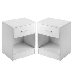 two white nightstands side by side with one open drawer and the other closed door