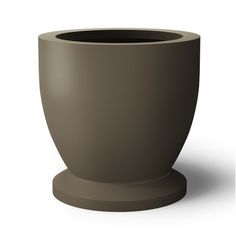 a large gray pot sitting on top of a white floor next to a black cup