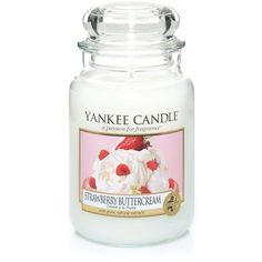 yankee candle with strawberry buttercream on the front and white frosting in the back