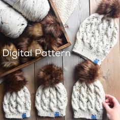 four hats with fur pom poms on them