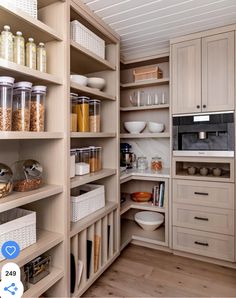 an organized pantry with lots of food in the cupboards and bowls on the shelves