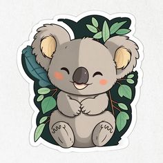 a sticker with a koala bear sitting on top of a leafy branch