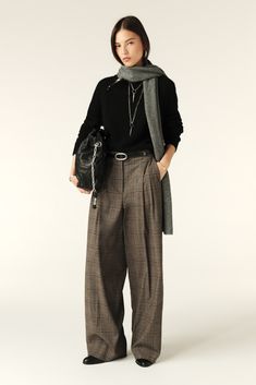 - Super comfortable loose fit pants- High waist- Inspired by Dad's pants- Darts in front for extra volume- Flowing feel with every movement- The ultimate back-to-school lookThis item is made with recycled wool. Loose Fit Trousers Women, Luxury Allsaints Bottoms For Spring, Pant Inspiration, Paris Fits, Pants Inspiration, Dad Pants, Comfortable Trousers, Tom Boy, Georgia May Jagger