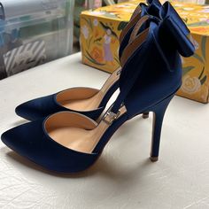 Navy Blue Bow Heels With Ankle Strap , New But Without Box And Tags, Never Worn Out Of The House, Only Tried On. They Didn’t Match Well With The Dress I Purchased To Wear Them With For A Wedding. Size 7 . Heel Height 4.5” Inches Navy Blue Quinceanera Shoes, Navy Blue And Gold Heels, Navy Wedding Shoes Bride, Midnight Blue Shoes, Midnight Blue Heels, Navy Heels Wedding, Heels With Blue Dress, Prom Heels Blue, Blue Ankle-high Heels For Party