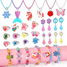 PRICES MAY VARY. Lovely Girl Toys: Our kids jewelry for girls is a complete set that includes 12 delightful toddler rings, 6 stylish little girl necklace, 6 stylish bracelets, and 4 pairs of adorable earrings. A total of 28 pieces of jewelry set are designed with colorful and playful themes that girls will love. Unicorn toys for girls age 4-6 are sweet, lively, and suitable for different outfits, also fun to share with friends. Perfect girl toys for imaginative play and dress-up games Adjustable Toddler Rings, Kid Jewelry, Toddler Jewelry, Princess Jewelry, Girl Necklace, Princess Dress Up, Jewelry For Girls, Unicorn Toys, Perfect Girl