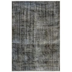 an area rug with grey and black colors