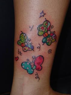 colorful butterfly tattoos on the ankle and foot are very popular among tattoo artists, but they're so cute