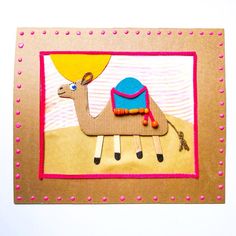 a card with a camel and a balloon on it