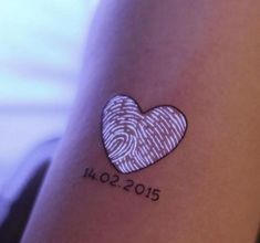 a fingerprint in the shape of a heart on someone's arm that reads, i love 2012