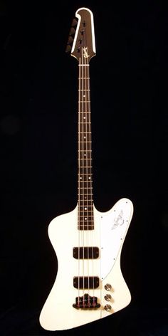 an electric guitar is shown in the dark