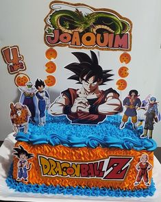 a dragon ball themed birthday cake with characters on it