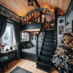 a bedroom with stairs leading up to the bed and christmas decorations on the wall above it