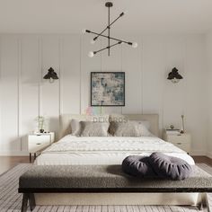 a bedroom with a large bed and white walls