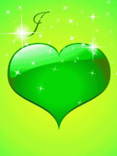 a green heart with sparkles on it