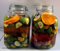 two glass jars filled with fruit and vegetables