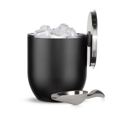 a black cup with ice in it next to a spoon