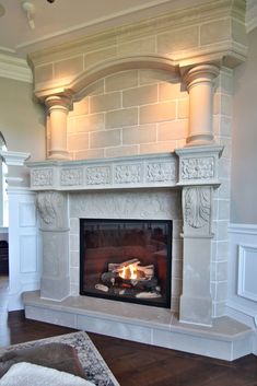 a fire place in the middle of a living room