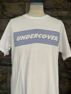 "Vintage 90s Under Cover Jun Takahashi Box Logo / Spell Out T shirt / Japanese Brand T shirt Item Condition: Pre-Owned (Used) condition. please see pictures Size on Tag: L, Please check measurement Tag : undercover ------------ Measurement: ------------- Chest (Pit to Pit) 20.5\" Length 27.5\" Shipping: Worldwide ---------- Standard Shipping 14-30 Days Express 5-8 Days I can do combined shipping +Add USD 5 shipping for each additional items!" Jun Takahashi, Logo Tshirt, Box Logo, 8 Days, Mens T Shirts, Mens Graphic Tee, Picture Sizes, Branded T Shirts, Tshirt Logo