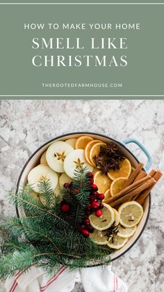 a bowl filled with lemons, orange slices and cinnamon on top of a table