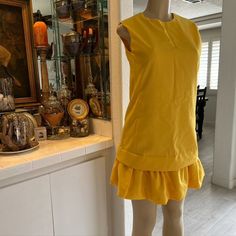 Vintage 60s 70s Canary Yellow Dress Cottagecore Dropwaist Pleated Vtg Glenbrooke Simply Stunning Please Feel Free To Make An Offer Or Bundle To Save !! Please Note This Item Is Vintage And We Suggest The Range Of Listed Sizes For Best Fit. Preowned, See Photos For Measurements Highend Estate, Rockabilly, Grunge, Prairie, Secretary, Pinup, Mod, Hippie, Floral Power, Party Dress, Off-White, Handmade, Custom, One Of A Kind, Mid Century Modern, Color Block, Unionmade, Cottoncore, Goth, Flowy, 3d, Ge Retro A-line Vintage Dress For Work, Retro Cocktail Mini Dress, Fitted Casual Dress For Vintage Fashion, Retro A-line Mini Dress For Work, Retro Knee-length Daywear Dresses, Retro Mini Dress With Ruffles, Vintage Mini Length Dress With Ruffles, Vintage Fitted Mini Dress With Ruffles, Retro A-line Dresses For Daywear