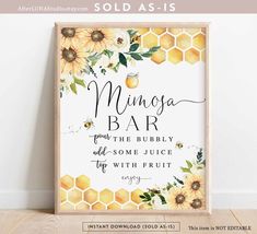 a poster with the words, honey and sunflowers on it in front of a wall