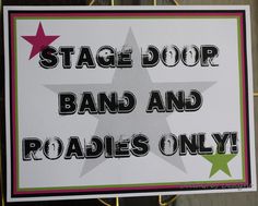 a sign that says stage door band and roadies only hanging on a wall in front of a gate