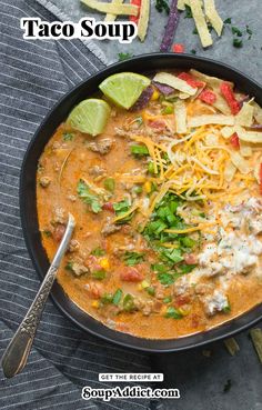 a bowl of taco soup with tortilla chips on the side