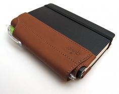 a brown and black leather case for a cell phone