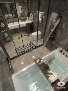 a bathroom with a bathtub, shower and sink in it's center area