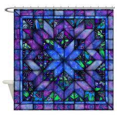 a blue and purple shower curtain with an abstract design