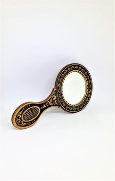 a magnifying glass sitting on top of a white table