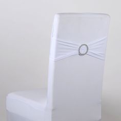 a white chair with a ring on it