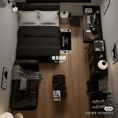 an overhead view of a small bedroom with black furniture