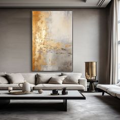 a living room filled with furniture and a large painting on the wall above it's couch