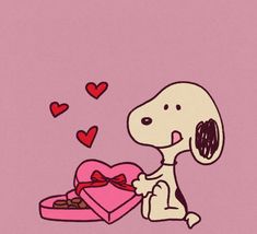 a cartoon dog holding a heart shaped box