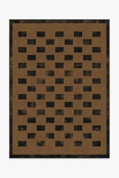 a brown rug with black squares on it