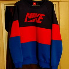 This Sweat Shirt Is New Without Tags. Never Been Worn. Nike Blue Cotton Sweatshirt, Nike Red Crew Neck Sweatshirt, College Blue Color Block Sweatshirt, Nike Blue Crew Tops, Nike Sweats, Nike Sweater, Sweaters Crewneck, Nike Men, Red And Blue