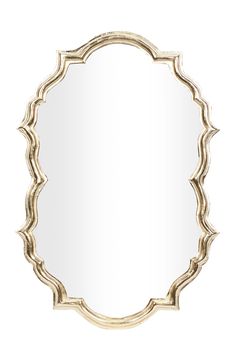 a round mirror with an ornate frame