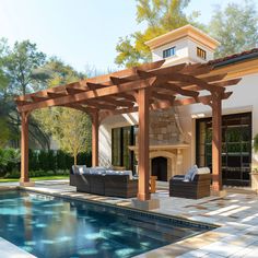 an outdoor living area next to a swimming pool